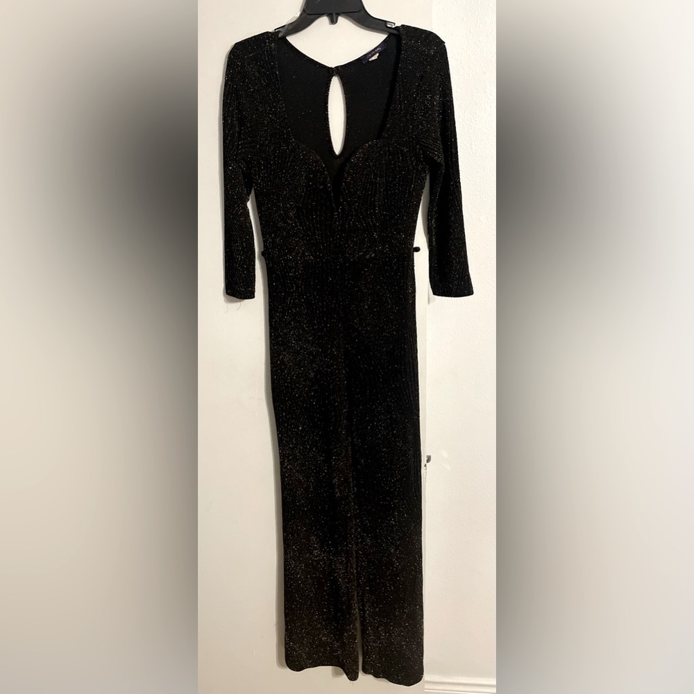 Jumpsuit with plunging, V-neck, wide-leg. Black and Gold. Size Large